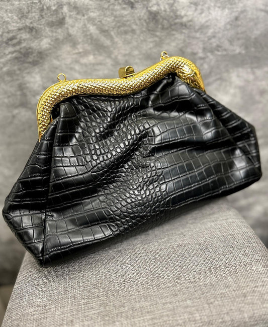 Snake handle croc leather clutch