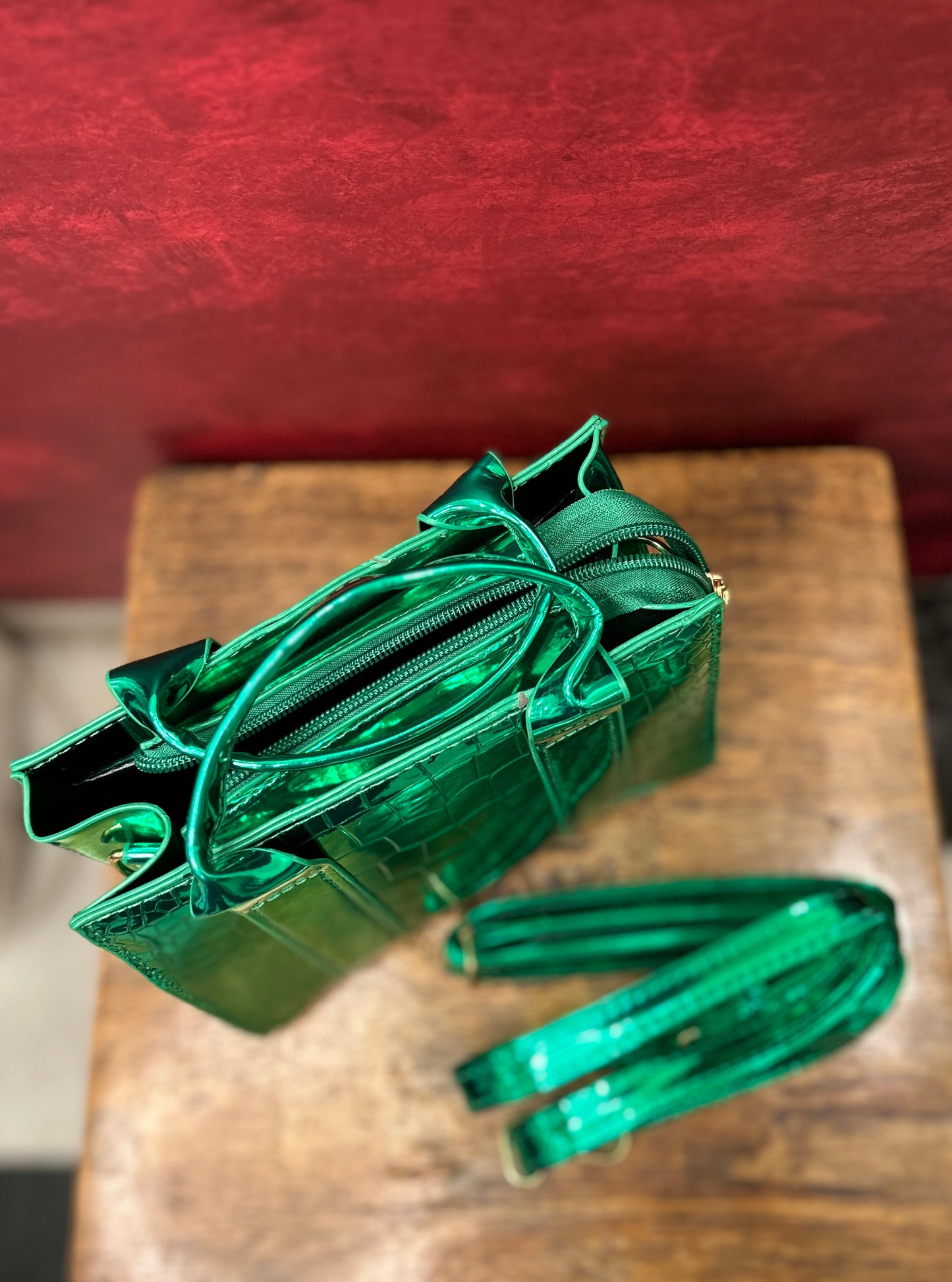 Metallic green sling bag