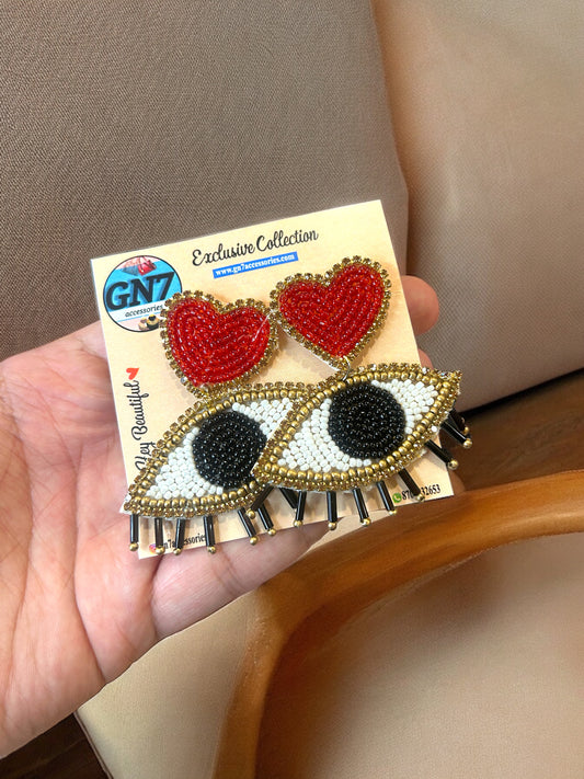 Red heart evil eye earrings