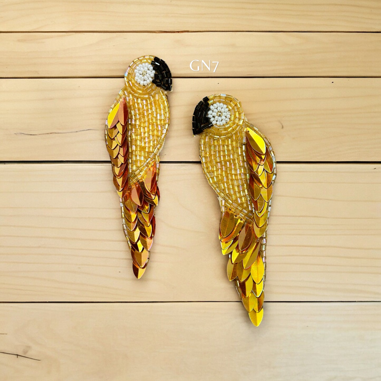 Panchi golden quirky earrings