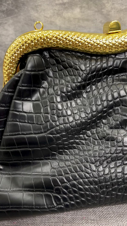 Snake handle croc leather clutch